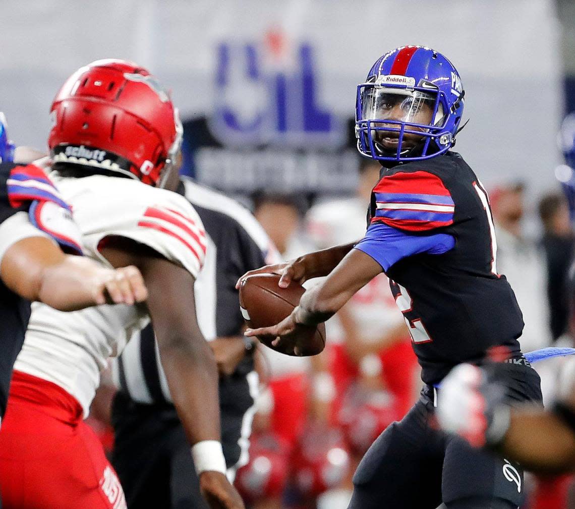 Duncanville quarterback Keelon Russell looks for a receiver down field in the first half of a UIL Class 6A D1 state championship football game at AT&T Stadium in Arlington, Texas, Saturday, Dec. 16, 2022. Duncanville and Galena Park North Shore wrere knotted at 21 at the half. (Star-Telegram Bob Booth)