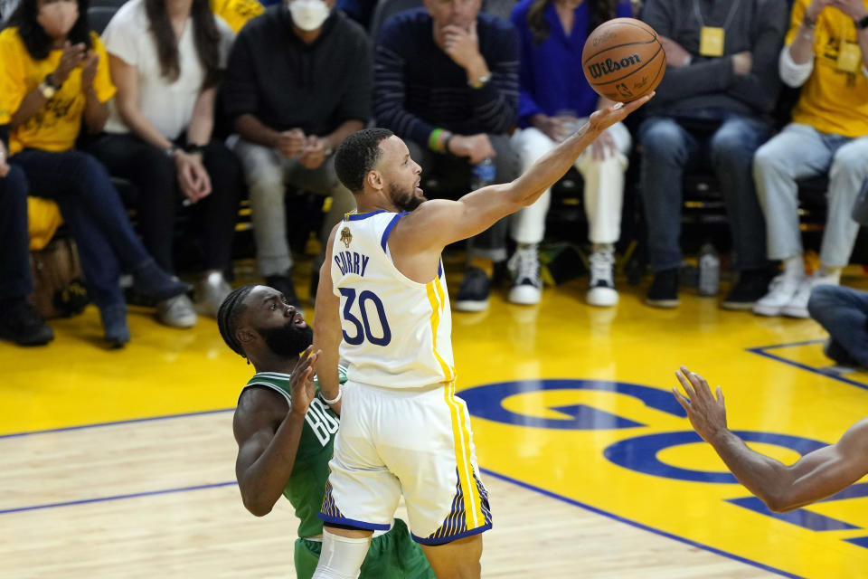 SAN FRANCISCO, CALIFORNIA - JUNE 02: Stephen Curry #30 of the Golden State Warriors shoots the ball against Jaylen Brown #7 of the Boston Celtics during the third quarter in Game One of the 2022 NBA Finals at Chase Center on June 02, 2022 in San Francisco, California. NOTE TO USER: User expressly acknowledges and agrees that, by downloading and/or using this photograph, User is consenting to the terms and conditions of the Getty Images License Agreement. (Photo by Thearon W. Henderson/Getty Images)