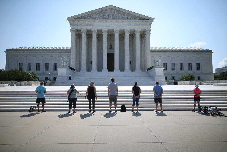 Anti-abortion demonstrators pray in front of the U.S. Supreme Court July 08, 2020 in Washington, DC. In a dual victory for religious groups, the court handed down decisions Wednesday in Little Sisters of the Poor v. Pennsylvania, ruling that employers with religious objections are allowed to decline to provide contraception coverage under the Affordable Care Act. (Chip Somodevilla/Getty Images)