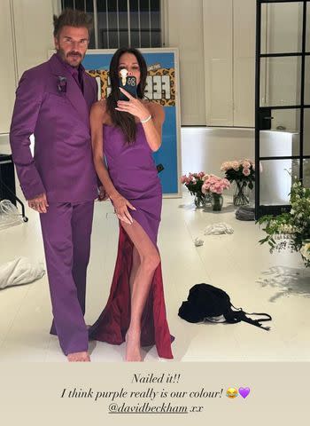 <p>Victoria Beckham/instagram</p> Victoria and David Beckham pose in their purple 1999 wedding outfits.