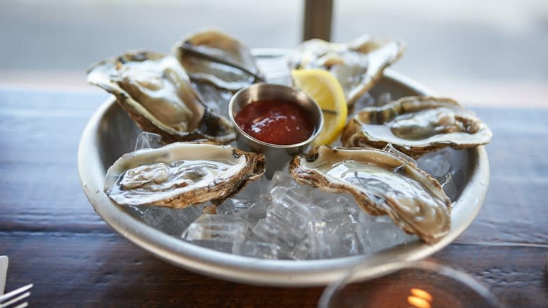 Tray of iced raw oysters