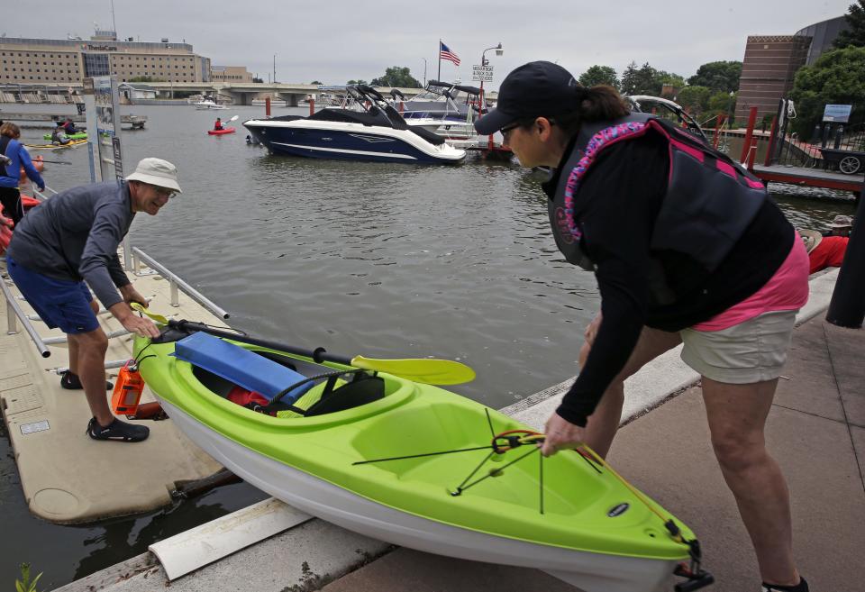 Kayakers use a launch at Shattuck Park in Neenah at the start of the 2018 Park-to-Park Paddle.