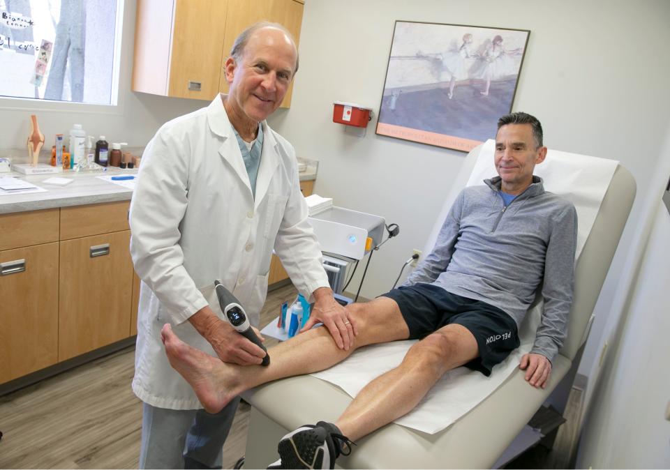John F. Connors P.D.M. is a Little Silver-based podiatrist who provides foot care for his customers. Connors with patient Henry Mercer of Rumson.  Little Silver, NJWednesday, February 15, 2023
