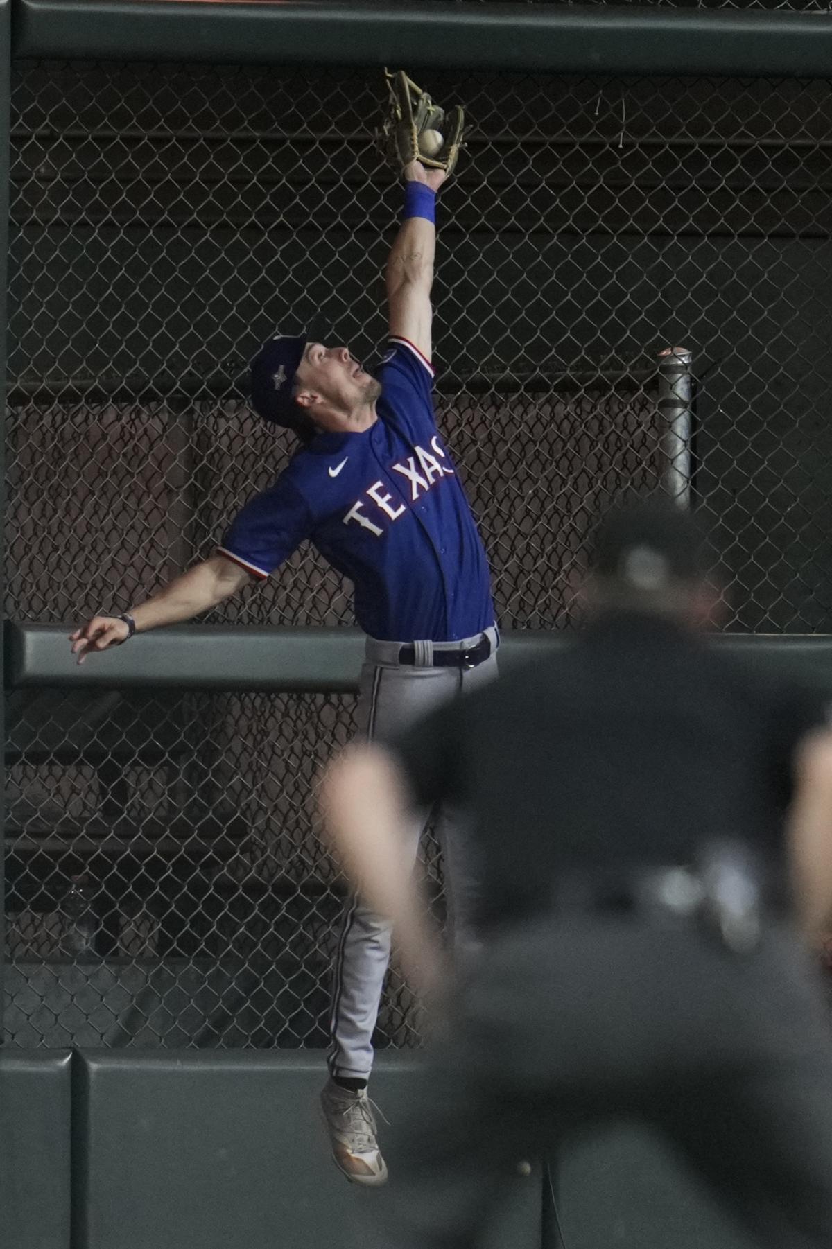 Rangers rookie Evan Carter shines with crucial catch in Championship ...