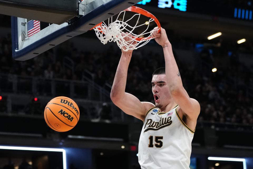 INDIANAPOLIS, INDIANA - MARCH 22: Zach Edey #15 of the Purdue Boilermakers dunks the ball against the Grambling State Tigers during the first half in the first round of the NCAA Men's Basketball Tournament at Gainbridge Fieldhouse on March 22, 2024 in Indianapolis, Indiana. (Photo by Dylan Buell/Getty Images)