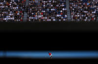 Spain's Rafael Nadal serves to Australia's Nick Kyrgios during their fourth round singles match at the Australian Open tennis championship in Melbourne, Australia, Monday, Jan. 27, 2020. (AP Photo/Andy Wong)