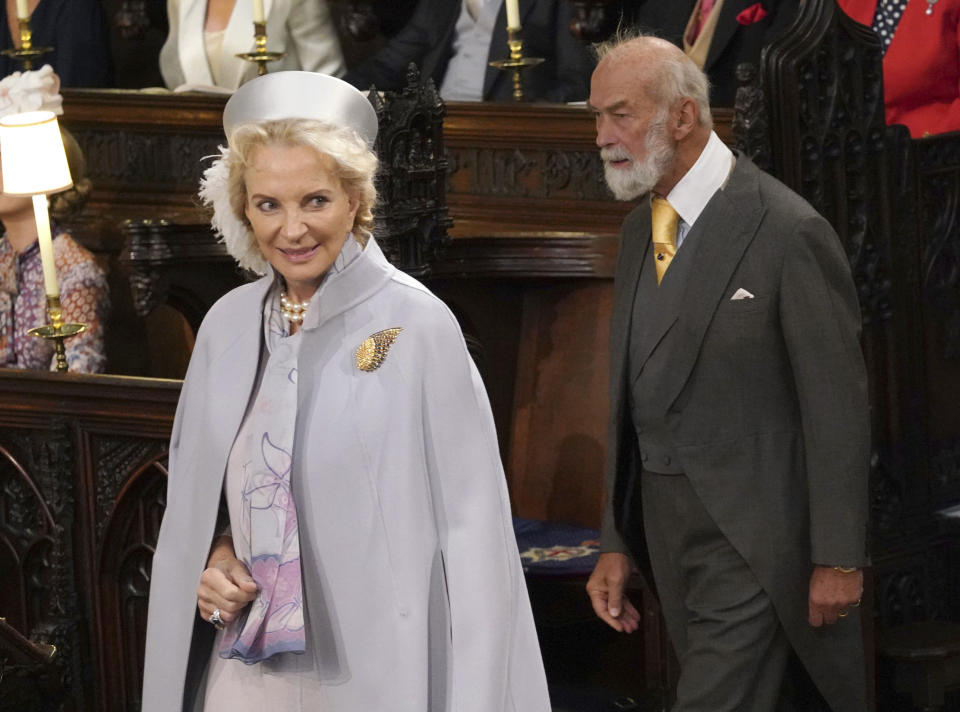 Britain's Prince Michael of Kent and Princess Michael of Kent take their seats ahead of the wedding of Princess Eugenie 