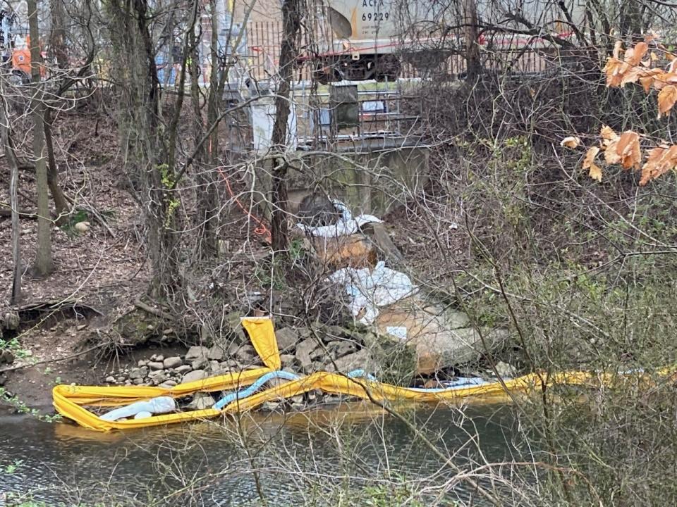 Teams from Lewis Environmental were drawing contaminated water from the Otter Creek.