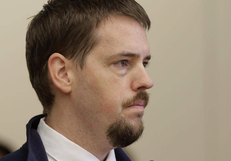 FILE - In a Wednesday, Sept. 28, 2011 file photo, Josh Powell, the husband of missing Utah woman Susan Powell, listens during a court hearing regarding the custody of his two sons in Tacoma, Wash. Days after a judge ruled against him in a child custody hearing in 2012, Powell and his sons were killed when police said he appeared to intentionally blow up the house with all three inside — a tragic ending to a bizarre case that began more than two years ago when the man's wife went mysteriously missing in Utah. Susan Powell's parents, Chuck and Judy Cox, have filed a civil suit against the state of Washington, alleging that negligence by the Washington state Department of Social and Health Services was a contributing factor that led to the deaths of their grandsons.(AP Photo/Ted S. Warren, File)