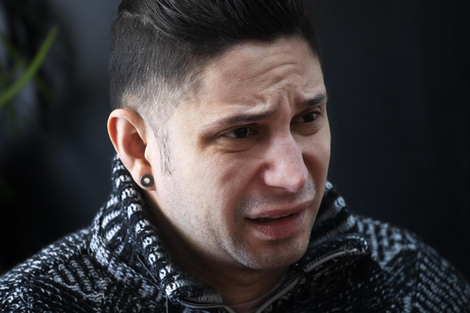 In this Feb. 28, 2020 photo, Venezuelan Kamal Morales discusses the plight of his Venezuelan boyfriend Gustavo Acosta during an interview in New York. Morales' boyfriend has spent the past year moving around U.S. immigrant detention centers in the deep south after they crossed the Mexico-U.S. border together to apply for asylum. Morales’ own asylum request was rejected and he was ordered deported, but is currently living in New York while on parole. (AP Photo/Mark Lennihan)