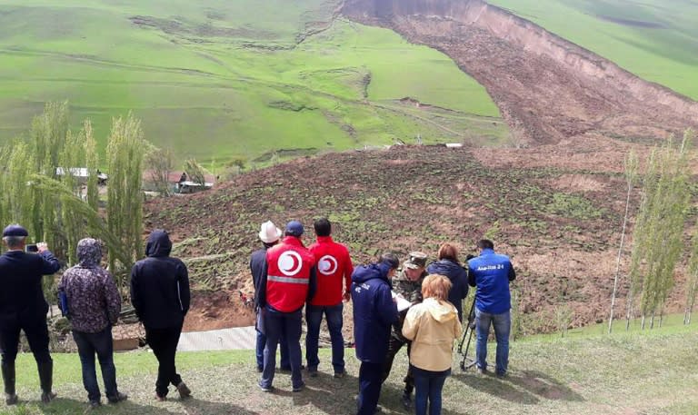 A handout picture taken on April 29, 2017 and provided by the Kyrgyz Red Crescent Society press service shows a general view of the landslide-hit Ayu villge in Kyrgyzstan's Osh region