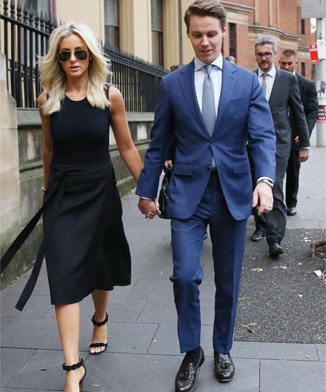 Roxy Jacenko wears two-piece and Louis Vuitton belt supporting husband  Oliver Curtis at court