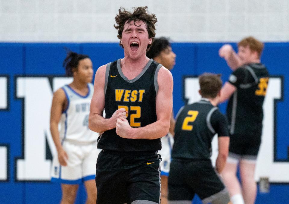 Central Bucks West's Dan Gallagher (22) celebrates during a first-round game in the Suburban One League Tournament against Bensalem on Friday, Feb. 9, 2024.

Daniella Heminghaus | Bucks County Courier Times