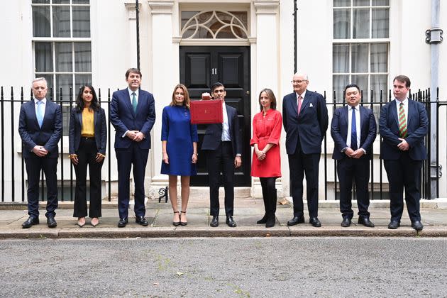 Chancellor of the exchequer Rishi Sunak holds the budget box as he stands with members of this Treasury team outside 11 Downing Street (Photo: Leon Neal via Getty Images)