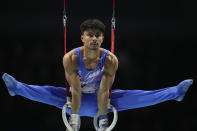 Jake Jarman of Britain competes on the rings at the Men's All-Around Final during the Artistic Gymnastics World Championships at M&S Bank Arena in Liverpool, England, Friday, Nov. 4, 2022. (AP Photo/Thanassis Stavrakis)