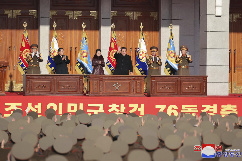 In this photo provided by the North Korean government, its leader Kim Jong Un, center right, with his daughter, center left, waves as they visit the defense ministry during an event for the 76th founding anniversary of the country's army in North Korea, Thursday, Feb. 8, 2024. Independent journalists were not given access to cover the event depicted in this image distributed by the North Korean government. The content of this image is as provided and cannot be independently verified. Korean language watermark on image as provided by source reads: "KCNA" which is the abbreviation for Korean Central News Agency. (Korean Central News Agency/Korea News Service via AP)