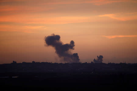 Smoke rises at the Gaza Strip following an Israeli strike, as seen from the Israeli side of the border, November 30, 2017. REUTERS/Amir Cohen