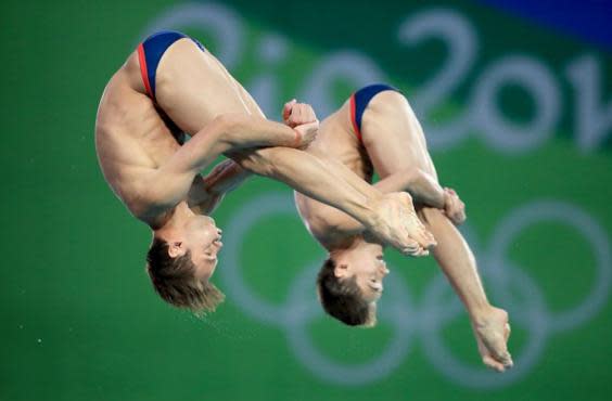 Tom Daley (left) in action at the 2016 Rio Olympics (PA)