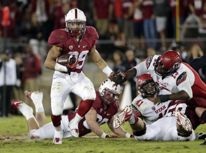 Stanford running back Kelsey Young runs against Utah during the second half of an NCAA college football game on Saturday, Nov. 15, 2014, in Stanford, Calif. Utah won 20-17 in overtime. (AP Photo/Marcio Jose Sanchez)