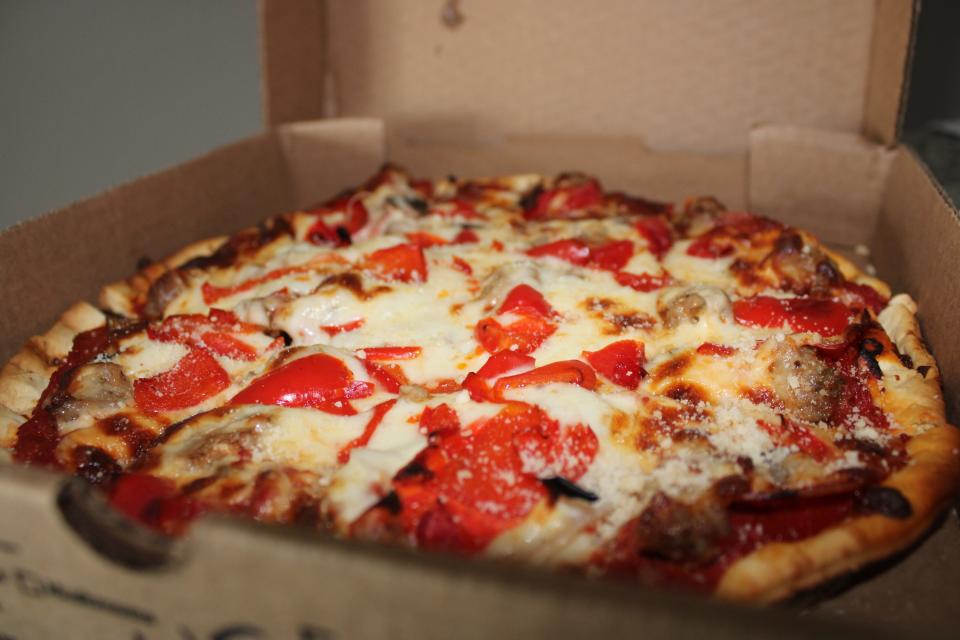 The Union Jack pizza, topped with Italian sausage, pepperoni, mushrooms, onions and red peppers, from Wig & Pen Pizza Pub in Iowa City.