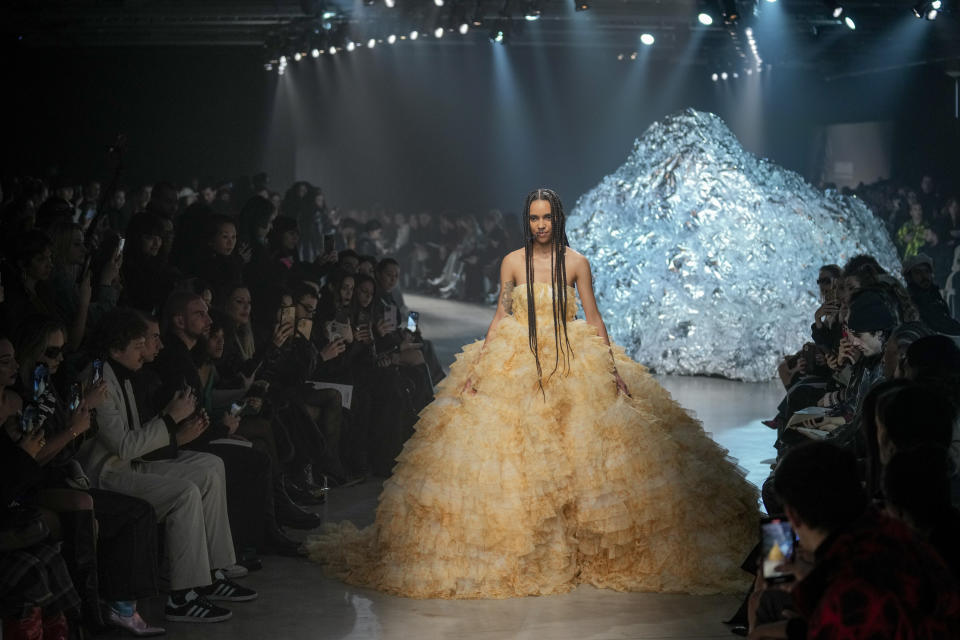 A model wears a creation as part of the Annakiki women's Fall-Winter 2023-24 collection presented in Milan, Italy, Sunday, Feb. 26, 2023. (AP Photo/Antonio Calanni)