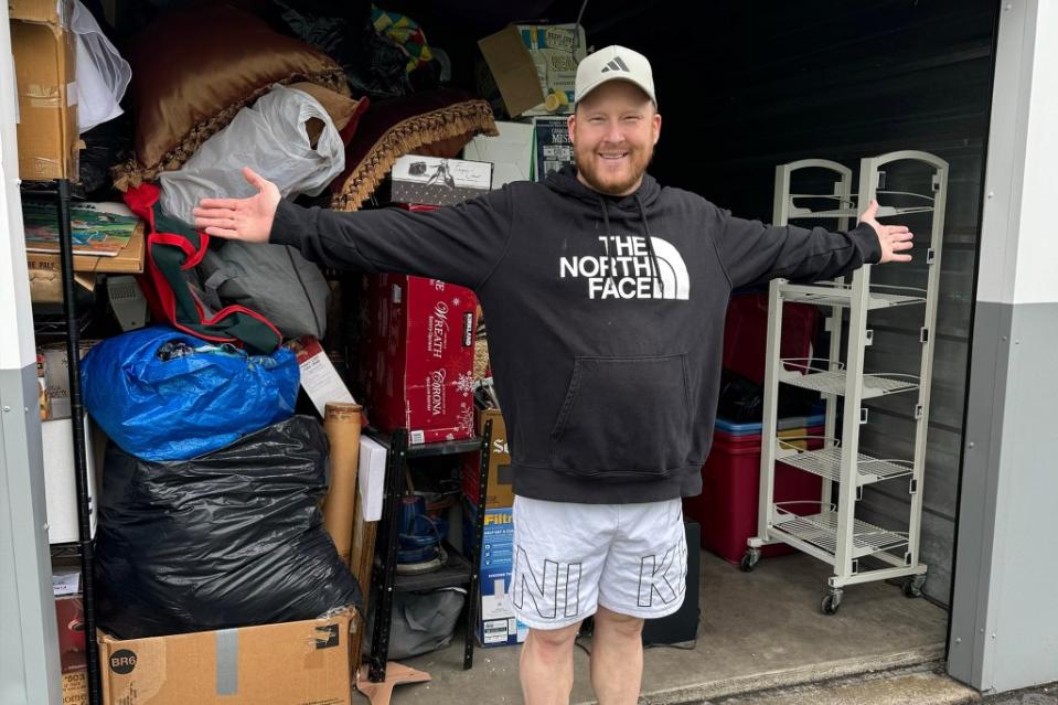 A man bought an abandoned storage unit at auction for $410 and was happily surprised to discover it was filled with $70,000 worth of designer clothes. Wade Venture / SWNS