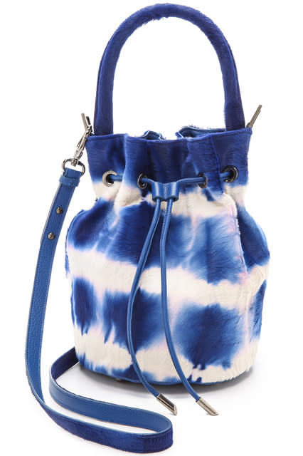 Tie-dye for grownups.<br><br><strong>Meli Melo</strong> Lux Guia Haircalf Bucket Bag, $, available at <a href="https://go.skimresources.com/?id=30283X879131&url=http%3A%2F%2Fwww.shopbop.com%2Flux-guia-bucket-bag-meli%2Fvp%2Fv%3D1%2F1536723345.htm%3Ffm%3Dsearch-viewall" rel="nofollow noopener" target="_blank" data-ylk="slk:Shopbop" class="link ">Shopbop</a>