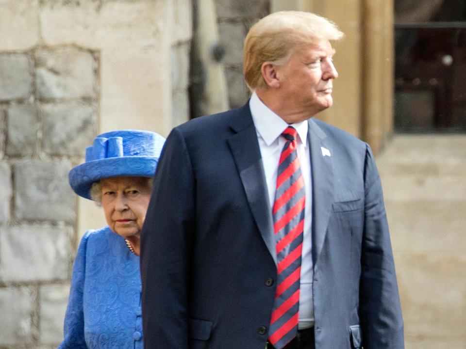 Donald Trump walks in front of Queen Elizabeth II at Windsor Castle in 2018.