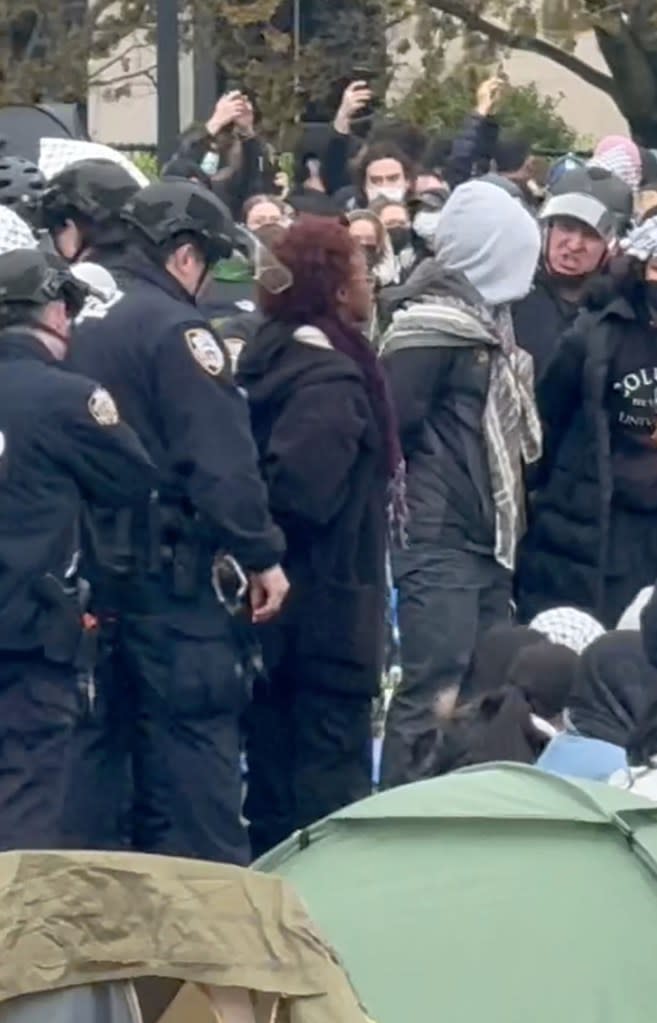 The 21-year-old Barnard College junior was spotted on video taken by The Post with her arms behind her back, grimacing as NYPD officers clad in riot helmets put her in cuffs. Robert Miller for NY Post