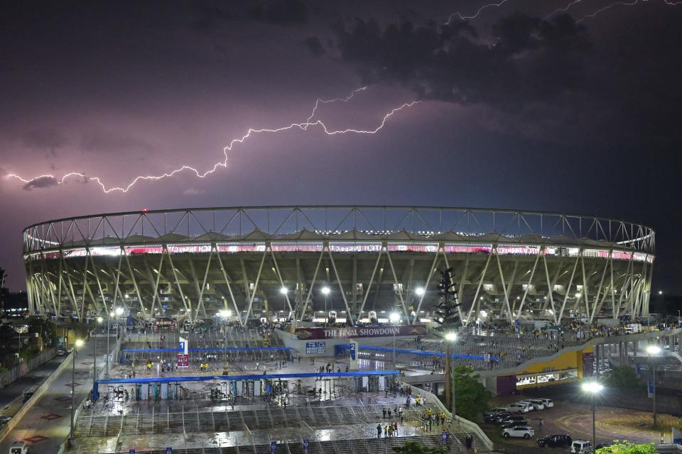 Lightning strikes over the Narendra Modi Stadium during the Indian Premier League (IPL) Twenty20 final cricket match between Gujarat Titans and Chennai Super Kings in Ahmedabad on May 29, 2023. Rain halted play in the Indian Premier League final in Ahmedabad for the second day running on May 29 with Chennai Super Kings chasing 215 for victory against defending champions Gujarat Titans. (Photo by Sam PANTHAKY / AFP) (Photo by SAM PANTHAKY/AFP via Getty Images)