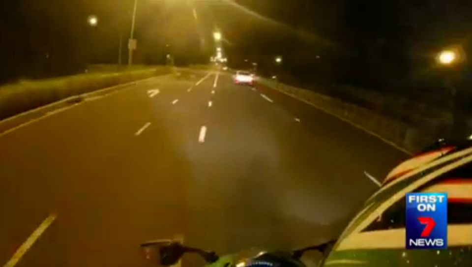 Seconds later, another police car appears and does the exact same manoeuvre, leaving the rider stunned. Photo: 7 News