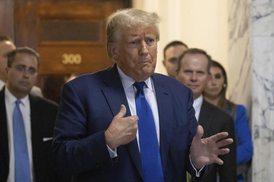 Former President Donald Trump speaks to the media as he exits the courtroom of his civil business fraud trial at New York Supreme Court, Wednesday, Oct. 25, 2023, in New York. (AP Photo/Yuki Iwamura)