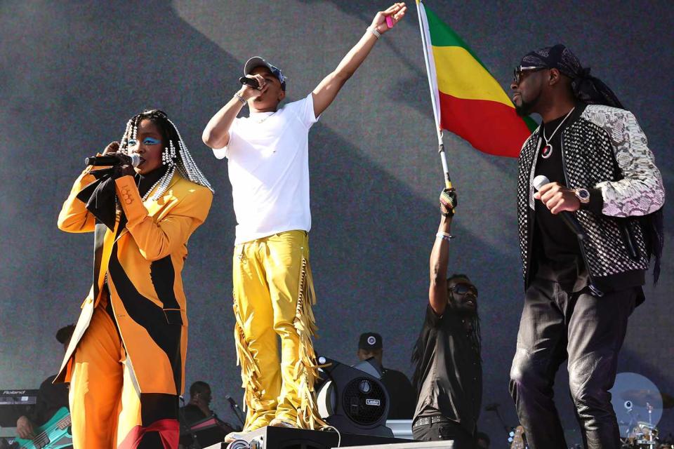 <p>Arturo Holmes/Getty Images</p> Lauryn Hill, YG Marley, Wyclef Jean performing together at Coachella Weekend 1 on April 14, 2024 in Indio, California