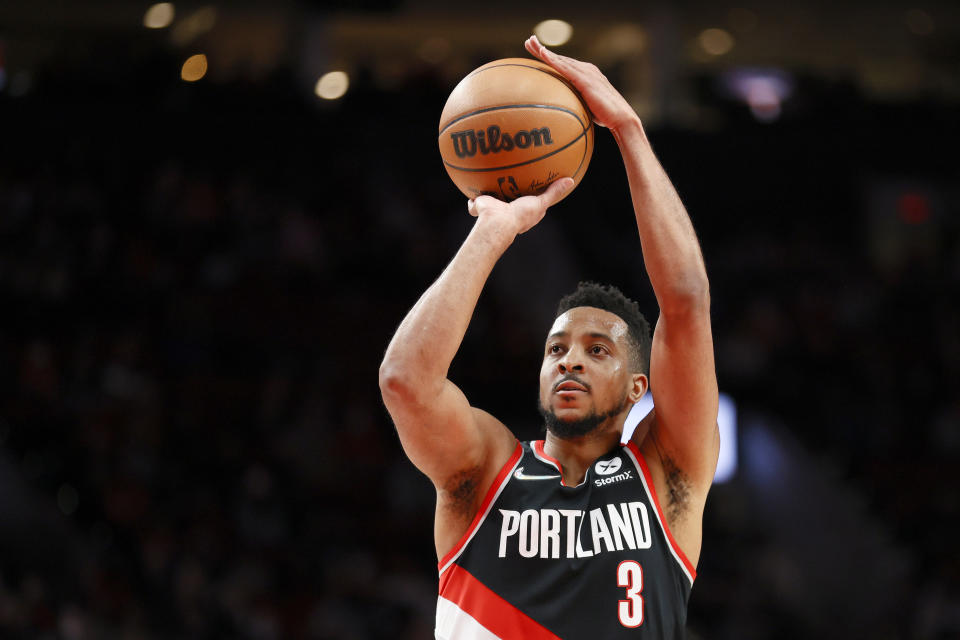 PORTLAND, OREGON - JANUARY 25: CJ McCollum #3 of the Portland Trail Blazers attempts a free throw against the Minnesota Timberwolves during the first half at Moda Center on January 25, 2022 in Portland, Oregon. NOTE TO USER: User expressly acknowledges and agrees that, by downloading and/or using this photograph, User is consenting to the terms and conditions of the Getty Images License Agreement. (Photo by Steph Chambers/Getty Images)