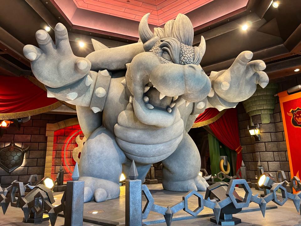 A giant Bowser statue greets riders of Mario Kart at Super Nintendo World at Universal Studios Hollywood in Southern California.