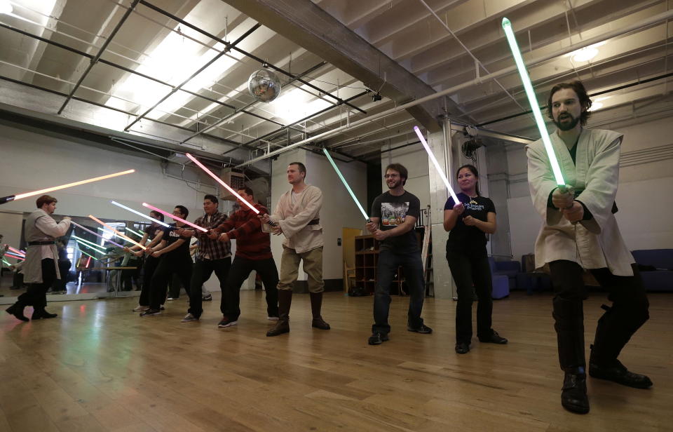 Golden Gate Knights instructor Alain Bloch, right, teaches during class in San Francisco, Sunday, Feb. 10, 2013. A group of San Francisco Star Wars fans who want to travel to a galaxy not that far away have created a combat choreography class for Jedis-in-training with their weapon of choice: the light saber. (AP Photo/Jeff Chiu)