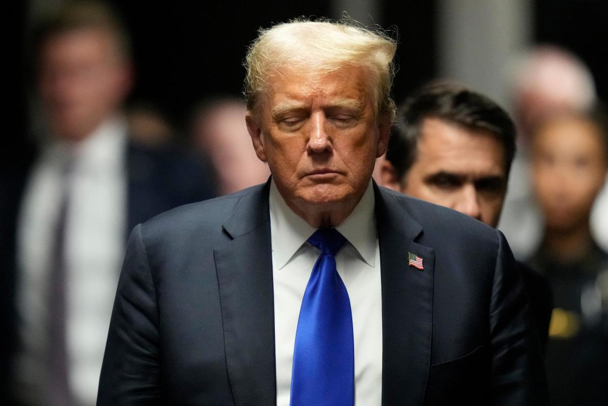 <span>Donald Trump leaves court after his guilty verdict in New York on Thursday.</span><span>Photograph: Seth Wenig/AP</span>