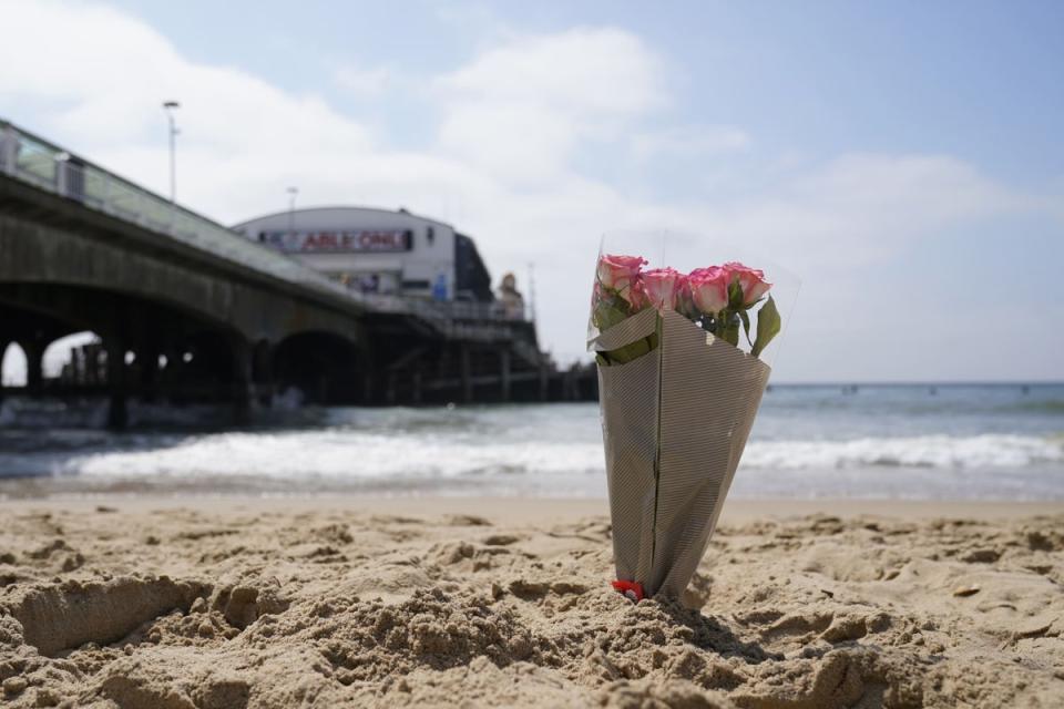 Floral tribute to youngsters who died near Bournemouth Pier (PA Wire)