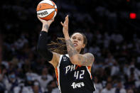 FILE - Phoenix Mercury center Brittney Griner (42) shoots during the first half of Game 1 of the WNBA basketball Finals against the Chicago Sky, on Oct. 10, 2021, in Phoenix. Jailed American basketball star Brittney Griner returns to a Russian court Thursday July 7, 2022, as calls increase for Washington to do more to secure her release. Griner was detained in February at a Moscow airport after vape canisters with cannabis oil allegedly were found in her luggage. (AP Photo/Ralph Freso, File)