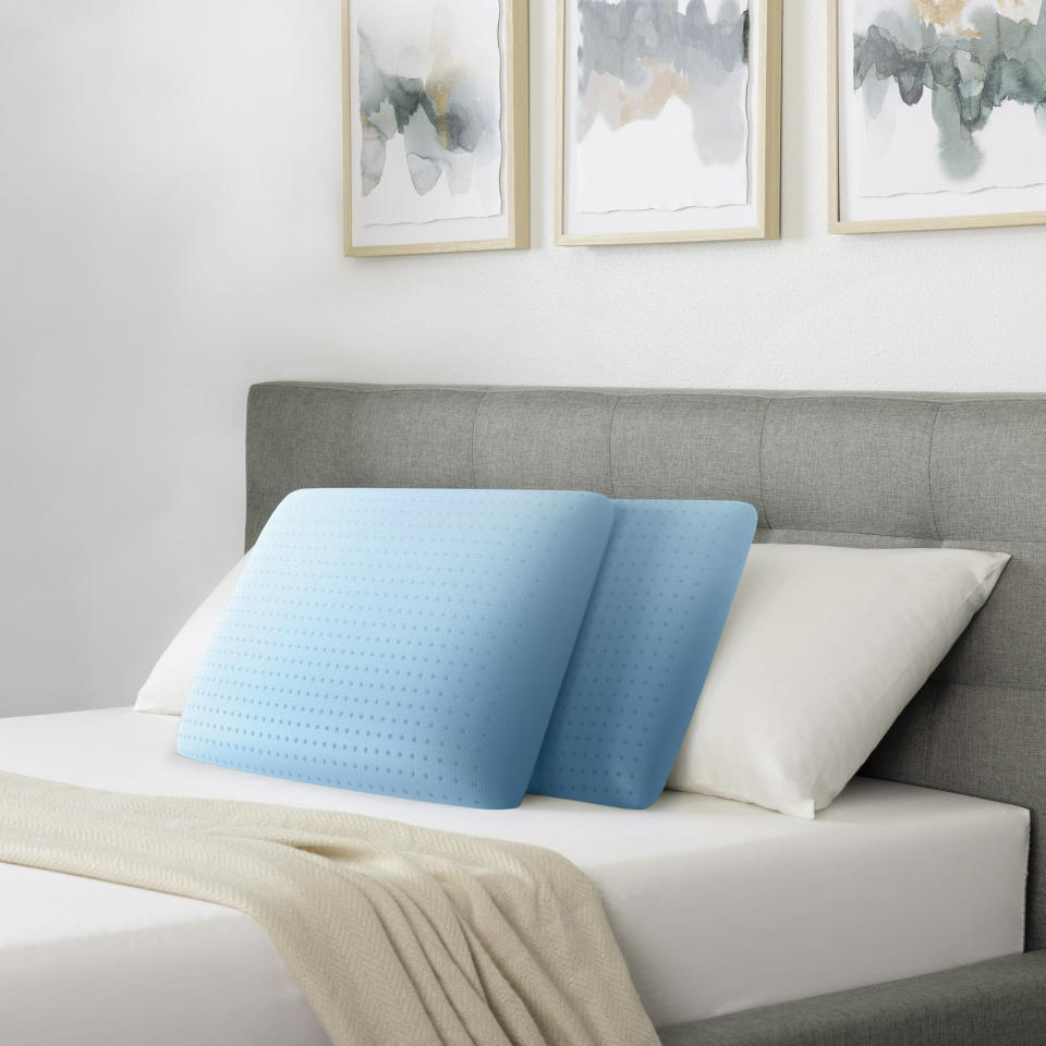 These memory foam pillows contour to the shapes of your body for a better night's sleep. (Photo: Walmart)