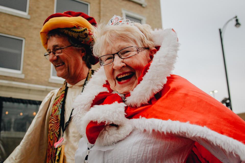 True/False Q Queen Carolyn Magnuson walks the parade route during the March March on Friday evening in downtown Columbia.