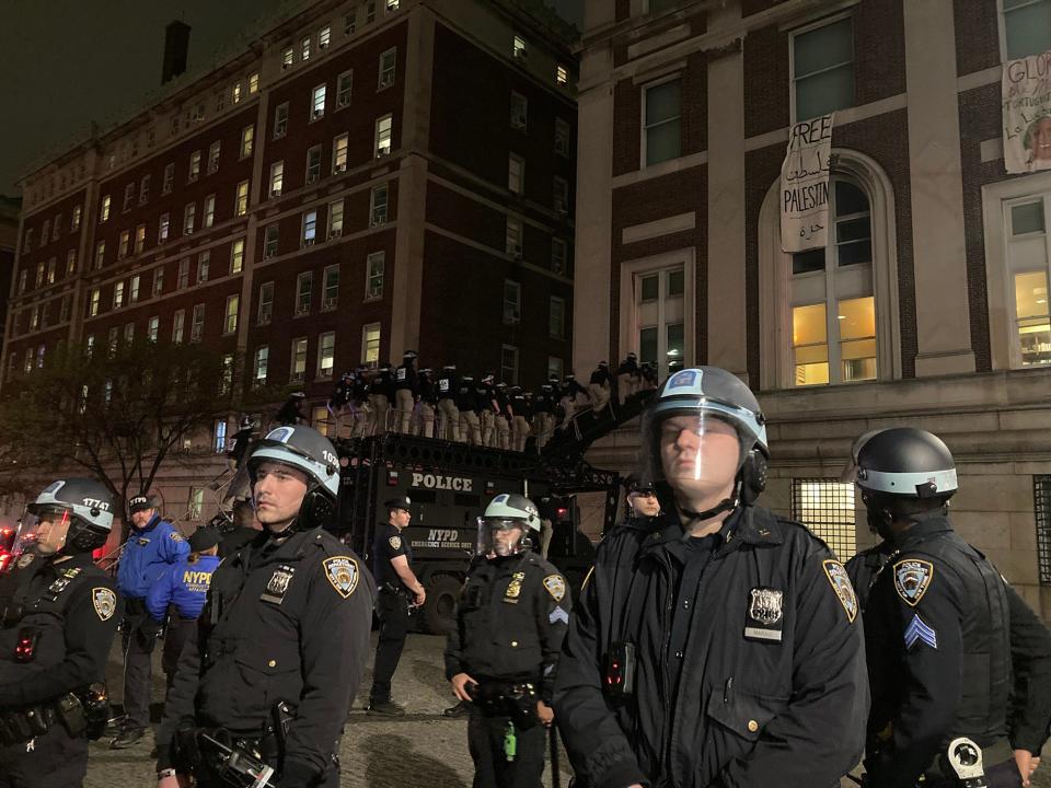 Police in riot gear enter Hamilton Hall on Columbia University in New York on April 30, 2024.Students at Columbia were among the first to embrace the pro-Palestinian campus encampment movement, which has spread to a number of universities across the United States.