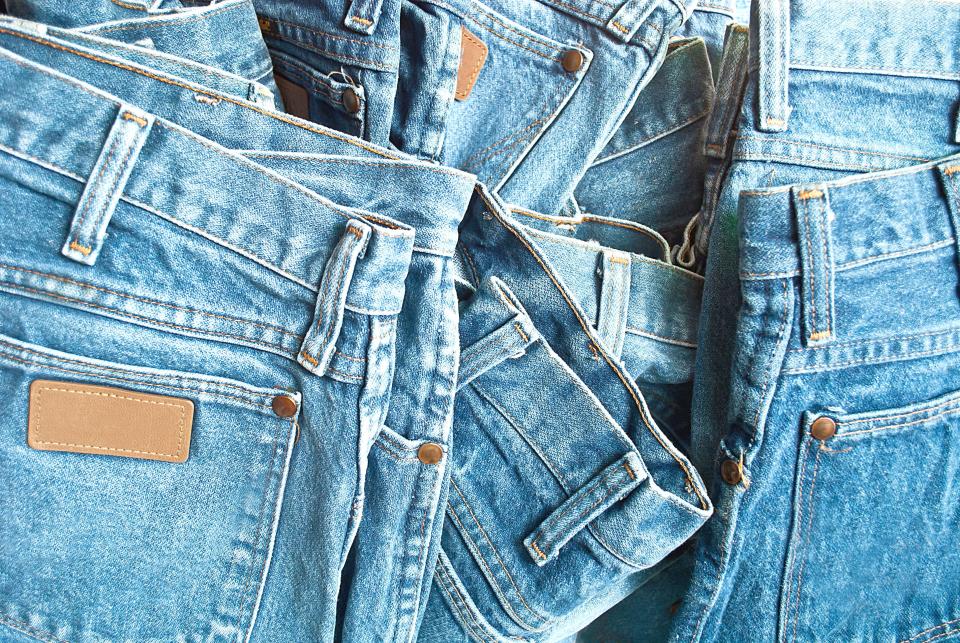 Your jeans-organizational woes making you blue? Hook 'em and hang 'em! (Photo: Getty)