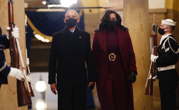 Former president Barack Obama and Michelle Obama, wearing Sergio Hudson, at the Presidential Inauguration in January.