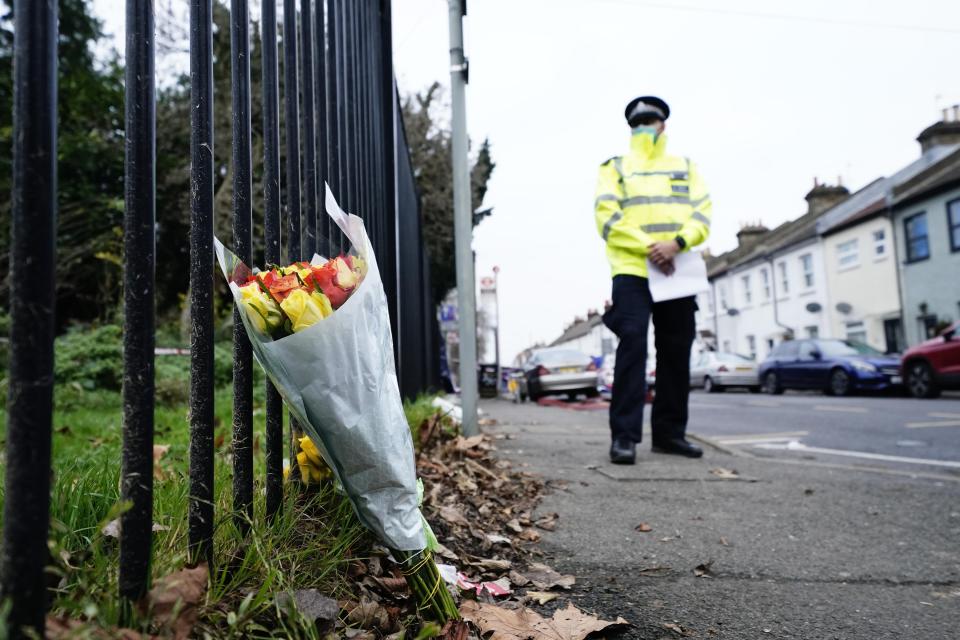 Tributes were left at the scene in Sutton on Friday. (PA)