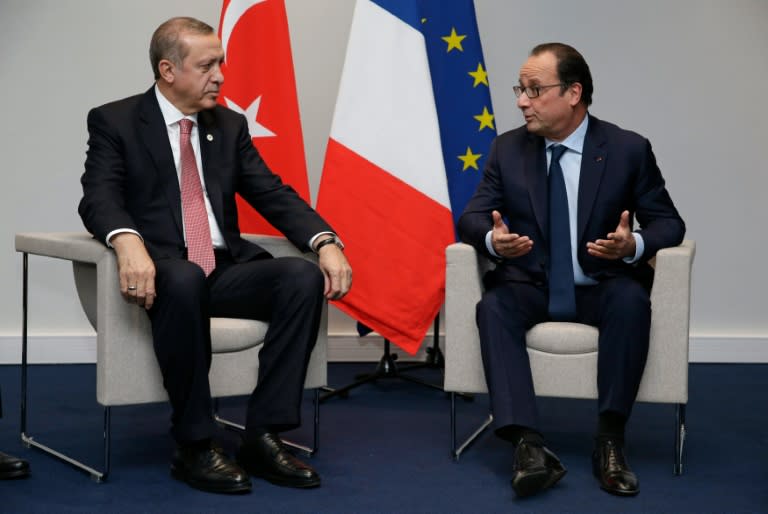 French President Francois Hollande (R) and Turkey's President Tayyip Erdogan hold a bilateral meeting during the opening day of the World Climate Change Conference 2015 (COP21) at Le Bourget, near Paris, on November 30, 2015