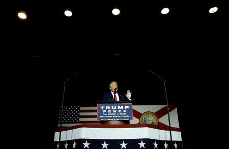 Republican U.S. presidential nominee Donald Trump speaks to the audience at a campaign rally in West Palm Beach, Florida, U.S., October 13, 2016. REUTERS/Mike Segar