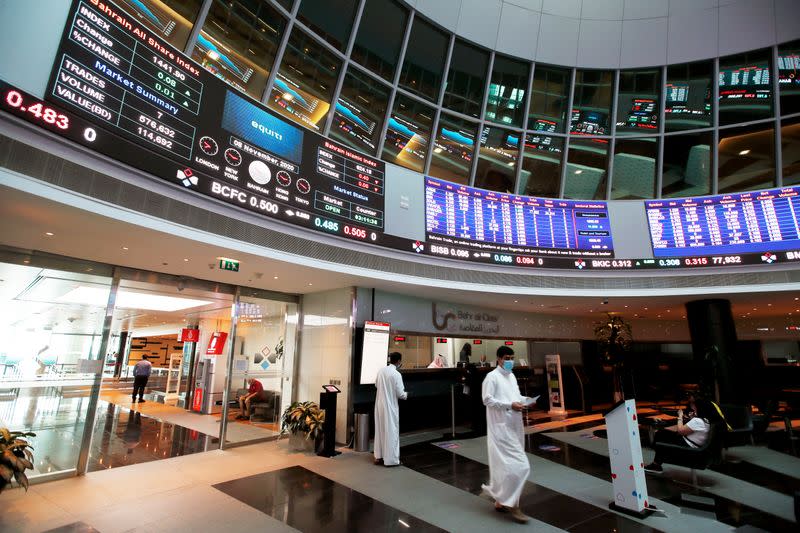 FILE PHOTO: Traders wait at the Bahrain Bourse in Manama