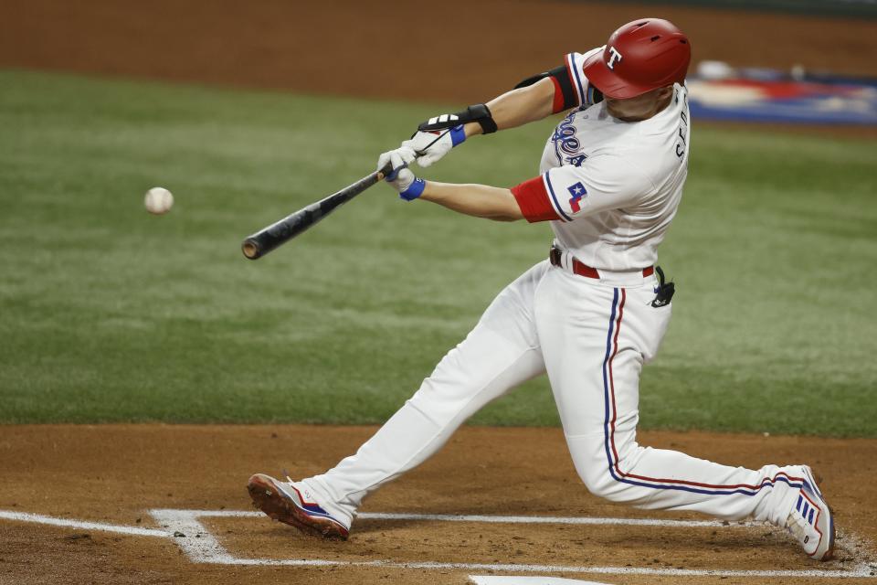 Corey Seager #5 of the Texas Rangers hits a double in the second inning against the Detroit Tigers at Globe Life Field on June 28, 2023 in Arlington, Texas.