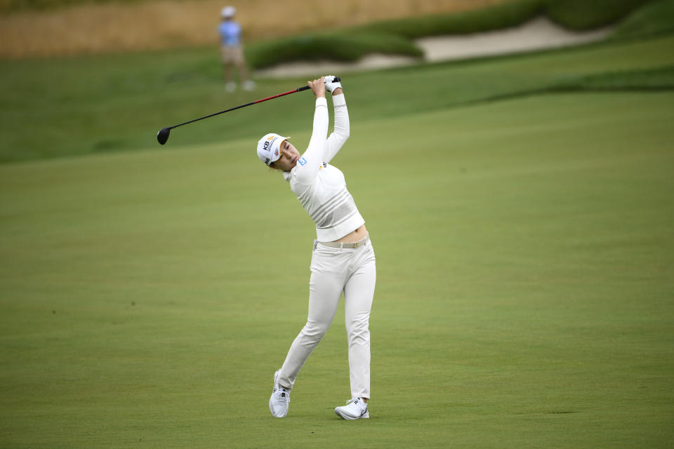 In Gee Chun, of South Korea, hits on the ninth fairway during the first round in the Women's PGA Championship golf tournament at Congressional Country Club, Thursday, June 23, 2022, in Bethesda, Md. (AP Photo/Nick Wass)